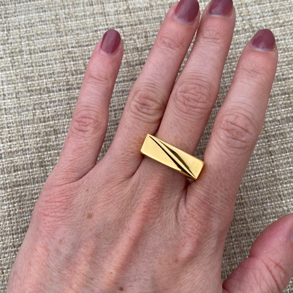 14k gold plated brass ring. 
Comes with box.